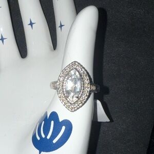 Vintage-Inspired Silver Ring with Clear Stones and Halo Design